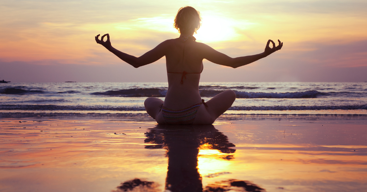 Person practicing deep breathing outdoors to support mental clarity and enhance keto for focus benefits